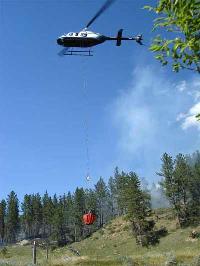 Photograph of a Bell 206L-I helicopter with Bambi Bucket Long Line